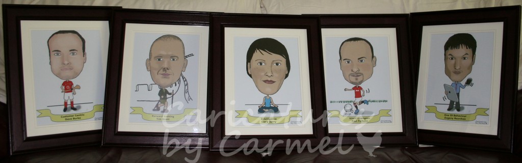 Five framed caricatures for company awards