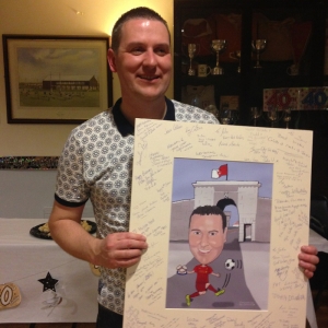 John celebrating his 40th Birthday with a Caricatures by Carmel Caricature Guest Signing Board